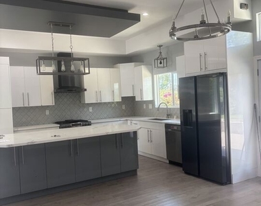 7925 Kittyhawk Avenue - Photo Thumbnail 2