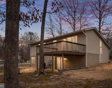 10704 Whiperwhill Court N - Photo Thumbnail 1