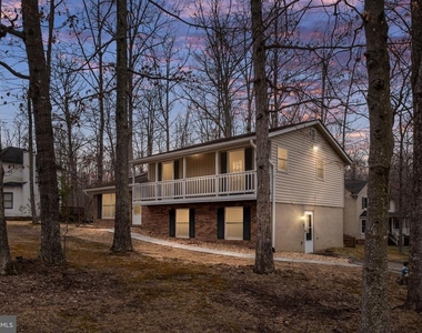 10704 Whiperwhill Court N - Photo Thumbnail 2