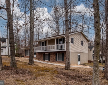 10704 Whiperwhill Court N - Photo Thumbnail 3