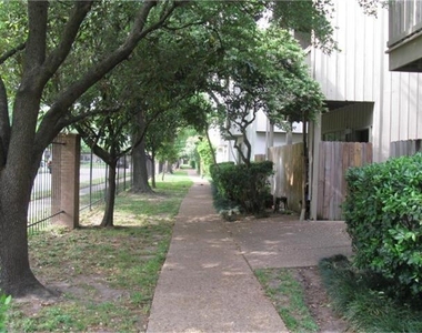 2100 Tanglewilde Street - Photo Thumbnail 2