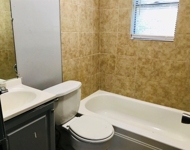8717 Spaulding Street - Photo Thumbnail 2
