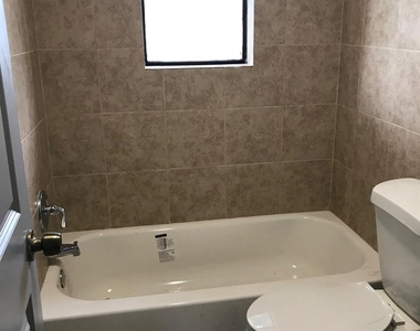 8717 Spaulding Street - Photo Thumbnail 9