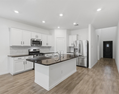 7214 Cordgrass Prairie Lane - Photo Thumbnail 2