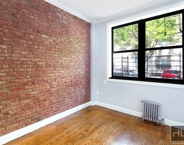 E 100th St - Photo Thumbnail 3
