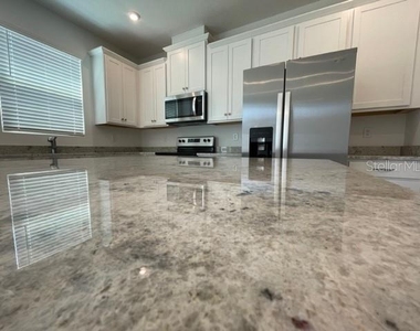 1136 Lakeshore Breeze Place - Photo Thumbnail 4