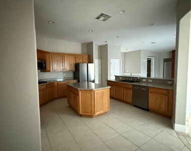 10027 Flokton Avenue - Photo Thumbnail 3