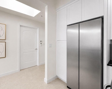 801 S Olive Avenue - Photo Thumbnail 3