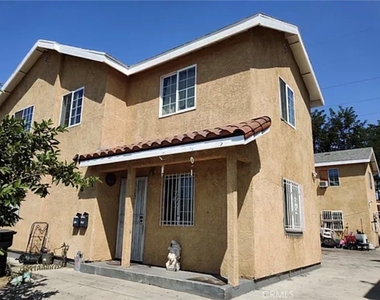 1755 E 92nd Street - Photo Thumbnail 1