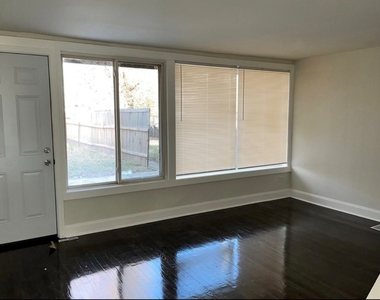113 E 37th Place - Photo Thumbnail 1
