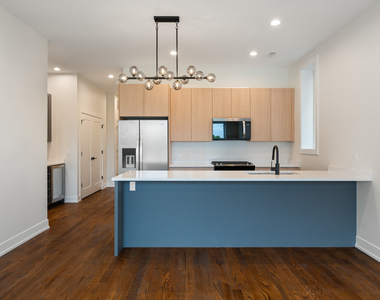 408 E 50th Place - Photo Thumbnail 1