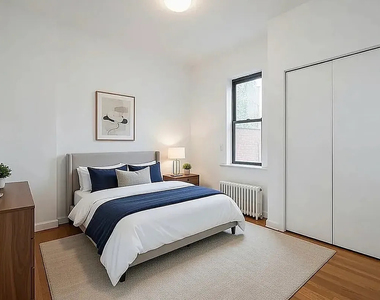 370 West 52nd Street - Photo Thumbnail 2