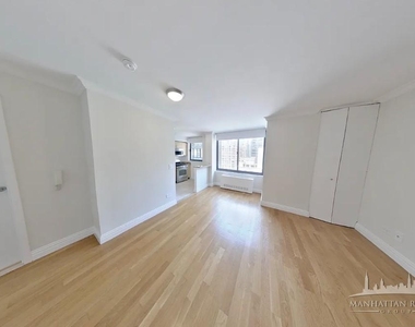 W 48th St - Photo Thumbnail 1