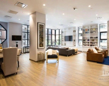 W 48th St - Photo Thumbnail 7