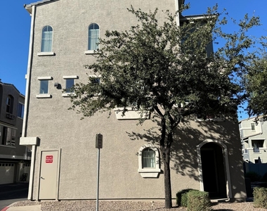 2402 E 5th Street - Photo Thumbnail 1