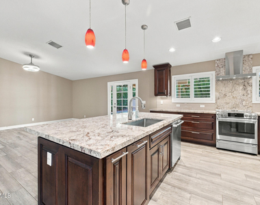 10720 E Clinton Street - Photo Thumbnail 3
