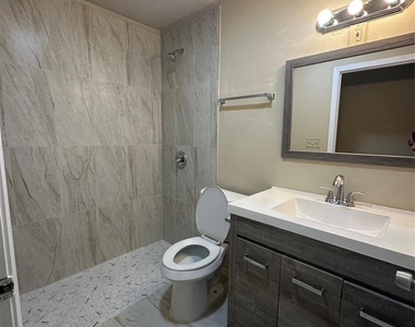 5001 Cummings Drive - Photo Thumbnail 2