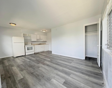 113 E 27th Street - Photo Thumbnail 1