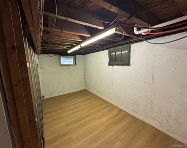 303 Woodbury Road - Photo Thumbnail 8
