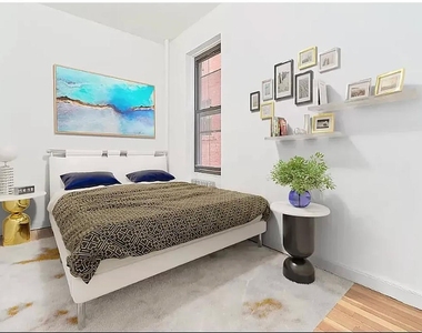 353 W 44th Street - Photo Thumbnail 4