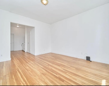 353 W 44th Street - Photo Thumbnail 3