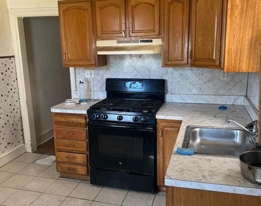 6879 Forrest Avenue - Photo Thumbnail 3