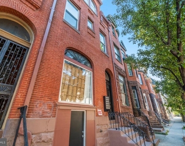 1927 Saint Paul Street - Photo Thumbnail 1