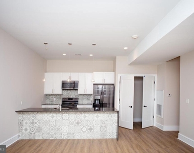216 W 9th Street - Photo Thumbnail 17