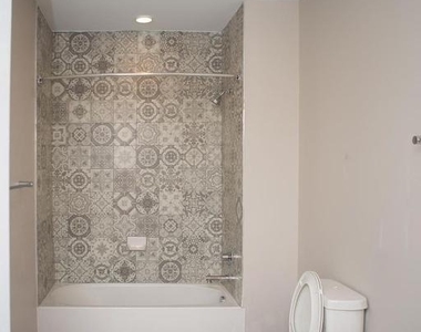 216 W 9th Street - Photo Thumbnail 12