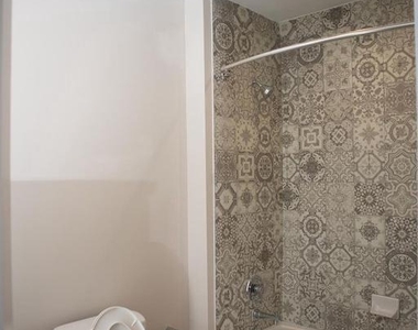 216 W 9th Street - Photo Thumbnail 3