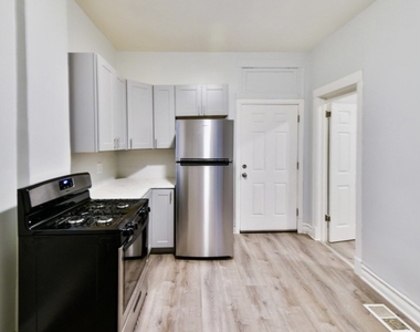 6344 S Eberhart Avenue - Photo Thumbnail 7