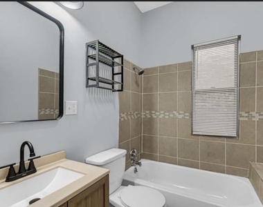 7349 S Evans Avenue - Photo Thumbnail 3