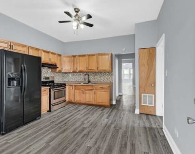 7349 S Evans Avenue - Photo Thumbnail 2