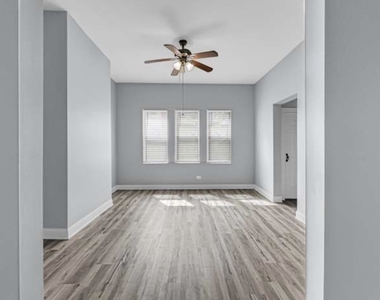 7349 S Evans Avenue - Photo Thumbnail 2