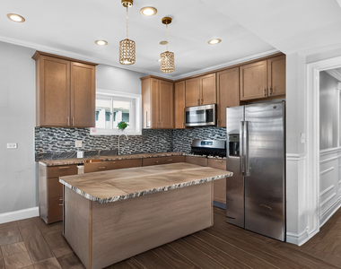 7440 S Paxton Avenue - Photo Thumbnail 7