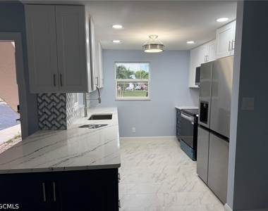 828 Victoria Drive - Photo Thumbnail 4