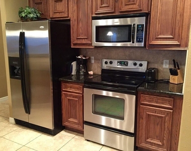 7039 Kingston Cove Lane Drive - Photo Thumbnail 6