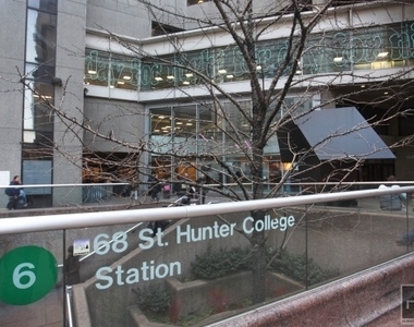 E 66 Street - Photo Thumbnail 2