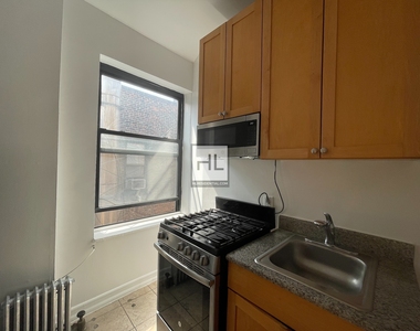 East 13th Street - Photo Thumbnail 3