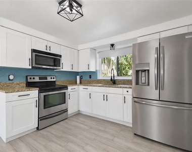 9616 Pine Ridge Avenue - Photo Thumbnail 9