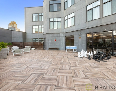 55-27 Myrtle Avenue - Photo Thumbnail 12
