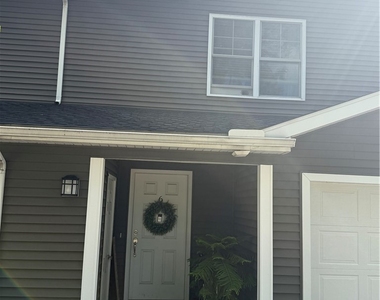48 Roger Chaffee Drive - Photo Thumbnail 1
