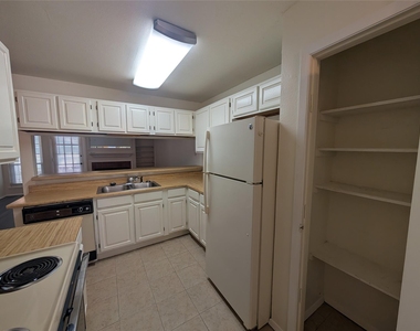 5981 Arapaho Road - Photo Thumbnail 5