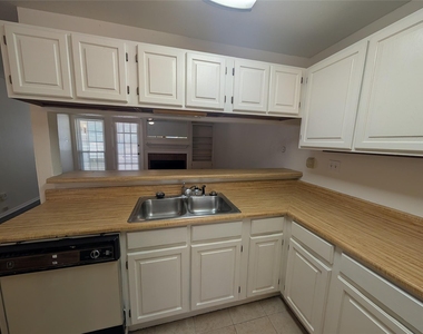 5981 Arapaho Road - Photo Thumbnail 7