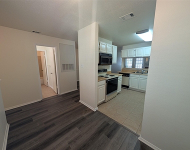 5981 Arapaho Road - Photo Thumbnail 3