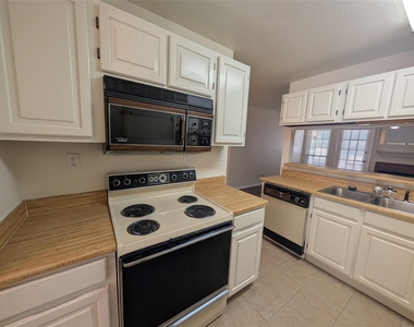 5981 Arapaho Road - Photo Thumbnail 6