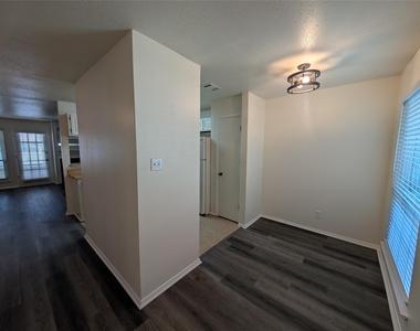 5981 Arapaho Road - Photo Thumbnail 2