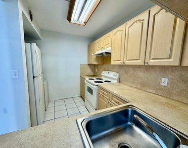10006 Winding Lake Road - Photo Thumbnail 2
