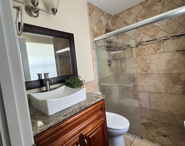 9135 Saddlecreek Drive - Photo Thumbnail 9