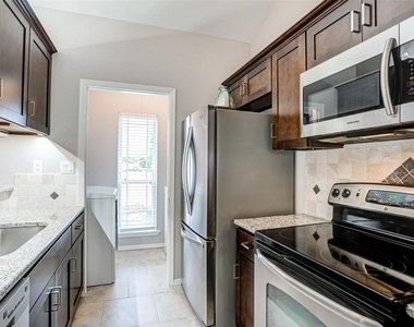 5981 Arapaho Road - Photo Thumbnail 4